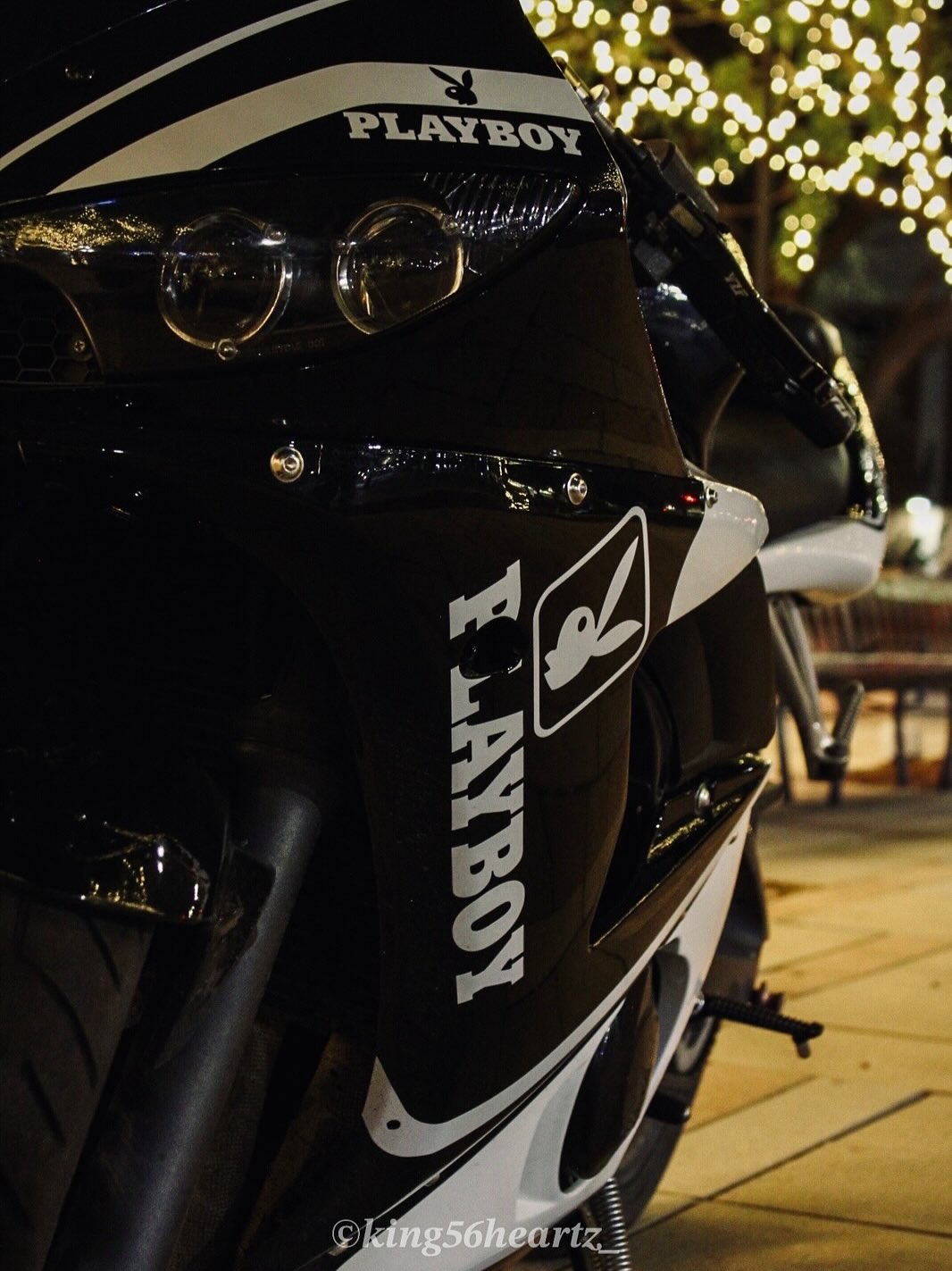 Close-up of a black motorcycle with Playboy branding-Yamaha R6 2003-2004