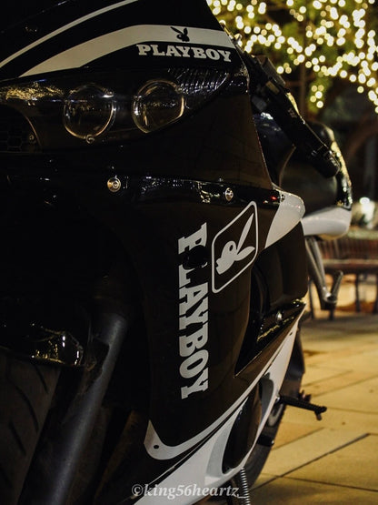 Close-up of a black motorcycle with Playboy branding-Yamaha R6 2003-2004